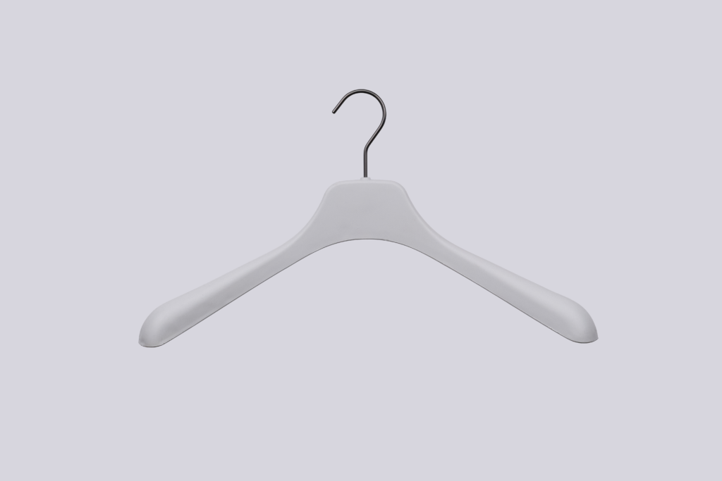 Hangers of London A single white plastic clothes hanger with a metal hook is centred against a plain light grey background.